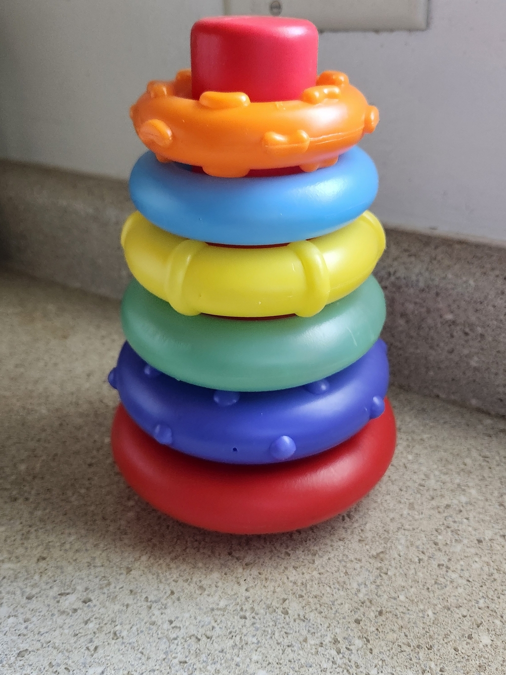 Infantino Rainbow Stacker Toy in Red, Orange, Blue, Yellow, Green, Purple, Pink